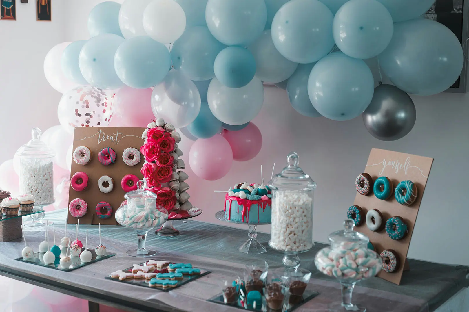 A table with many different types of desserts.